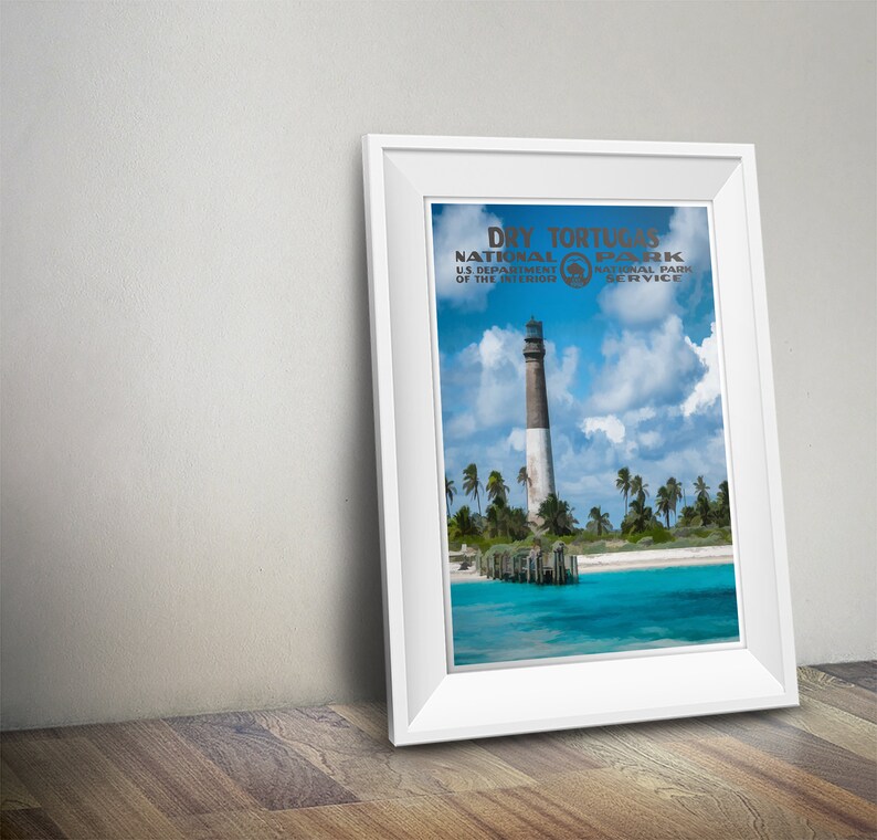 May include: A vintage-style poster featuring a lighthouse on a tropical island. The poster reads "Dry Tortugas National Park, US Department of the Interior, National Park Service".