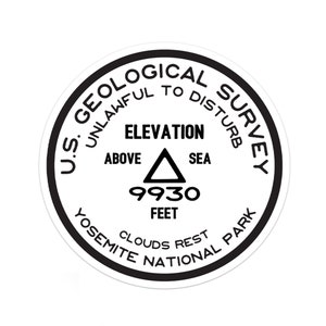 May include: A black and white circular sign with the text "U.S. GEOLOGICAL SURVEY UNLAWFUL TO DISTURB" around the edge. The center of the sign reads "ELEVATION ABOVE SEA 9930 FEET CLOUDS REST YOSEMITE NATIONAL PARK".