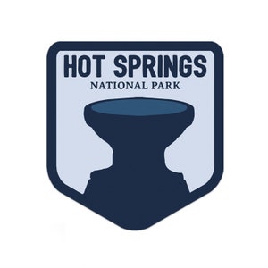 May include: A blue and white badge with the text "HOT SPRINGS NATIONAL PARK" and a silhouette of a hot spring.