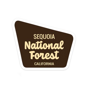 May include: A brown and white sticker with the text "Sequoia National Forest California".