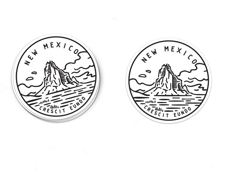 May include: Two black and white circular stickers featuring a mountain range and the text "New Mexico Cresci Et Eundo" in a circle around the mountain range.