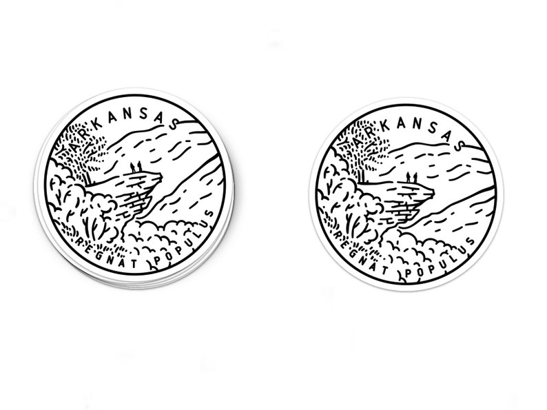 May include: Two black and white stickers with a circular design. The stickers feature a mountain range with the text "ARKANSAS REGNAT POPULUS" around the edge.