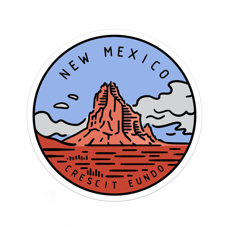 May include: A round sticker with a blue and white sky background, a red mountain with a black outline, and the text "NEW MEXICO CRESCIT EUNDO" in a black circle.