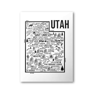 May include: A black and white illustration of the state of Utah, with the state's name at the top and a map of the state below. The map is filled with the names of cities, towns, and points of interest, including national parks, forests, and lakes. The text "Life Elevated, The Beehive State" is at the bottom of the map.