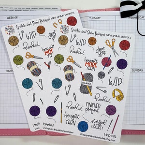 May include: Two sheets of stickers featuring hand-drawn illustrations of yarn balls, crochet hooks, scissors, and other crafting supplies. The stickers are white with black outlines and feature colourful accents. The text on the stickers reads "Sparkle and Shine Designs hand drawn stickers", "WIP", "hooked", "just frog it!", "bought more yarn", "crocheted", "finished project", "started a new project", "Hook Inspo", "Hooked Instagram: @sparkleshineshstudios", "HKD-001", "Otay sparkleshineshstudios.etsy.com".