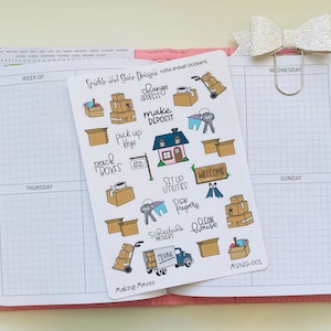 May include: A sheet of stickers with illustrations of moving boxes, keys, a house, a moving truck, and other moving-related items. The stickers are hand-drawn and have a whimsical style. The text on the sheet reads "Sprinkle and Shine Designs hand drawn stickers" and "Making Moves".