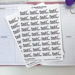 May include: Two sheets of white stickers with the text "Nail Appointment" in a handwritten font, each with a small nail polish bottle illustration. The stickers are on a planner page with a purple bow.