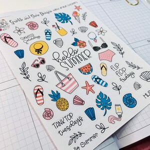 May include: A sheet of colorful summer-themed stickers with various designs, including a pineapple, watermelon, flip flops, a beach bag, a seashell, a starfish, a palm leaf, and the text "Hello Summer".