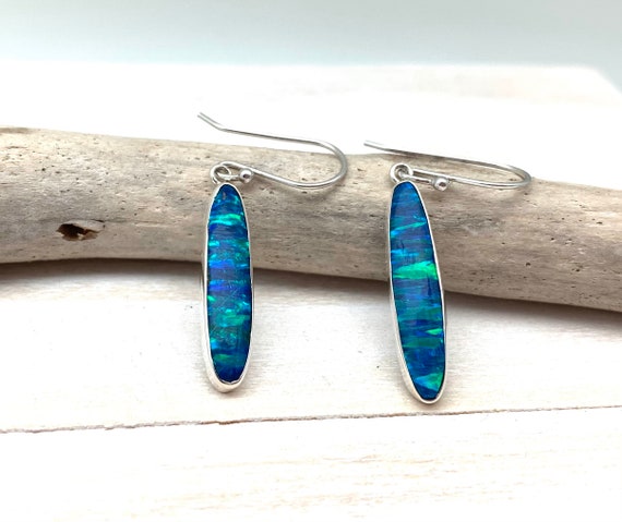 Blue fire hotsell opal earrings