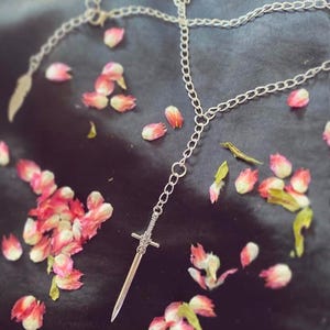 Silver plated sword “Damocles” pendant drop necklace with feather fastening