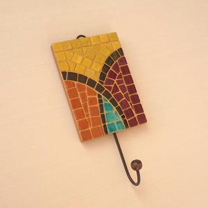 Vibrant decorative wall hook with abstract mosaic art pattern