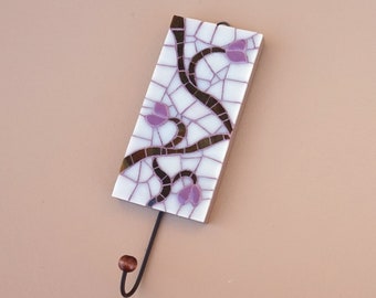 Decorative wall hook with abstract floral pattern