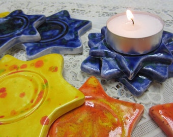 Set of 9 Stackable Ceramic Colorful Star of Davids to hold Tea Lights for Hanukkah Menorah