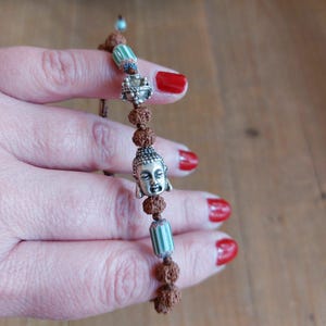 Spiritual Gift Bracelet Buddha Charm Design Handmade Beaded Jewelry Women Fashion Accessory Meditation Practice Aid Rudraksha Beads Combination Tibetan Style Elements Bohemian Look Creation Adjustable Size Comfort Unique Present Idea Yoga