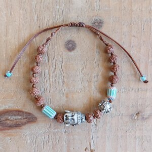 Boho Style Bracelet Buddha Charm Jewelry Handmade Beaded Design Women Fashion Accessory Spiritual Collection Rudraksha Beads Tibetan Craftsmanship Adjustable Size Comfort Fit Daily Wear Option Unique Bohemian Look Meditation Practice Aid