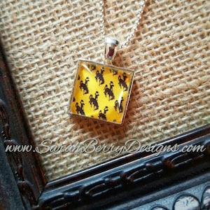 Wyoming Cowboys Necklace Silver Tone Bucking Horse Pendant Brown and Gold University of Wyoming Alumni Gifts UW Go Pokes 307 Pistol Pete