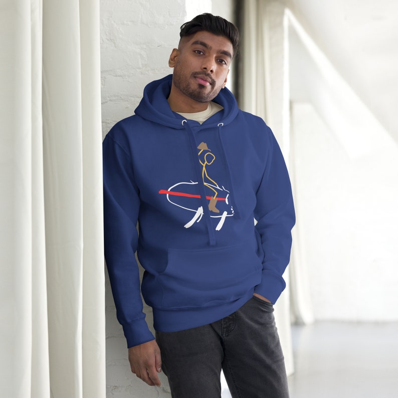 May include: A navy blue hoodie with a white graphic of a stick figure riding a bull. The bull is white with red and black accents.