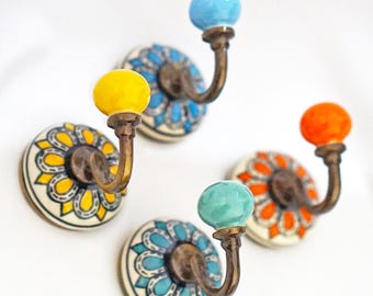 thumbnail interactive-video image 1 of Rustic Cast Iron Crown Hook – Single Towel Or Hat Hook For Kitchen, Bath, Or Entryway 1 of 4