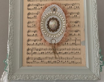 Handmade piece of art, pearls, vintage jewellery and frame.