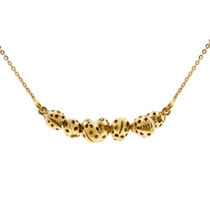 Collar La belleza de las mariquitas: oro, plata y oro rosa
