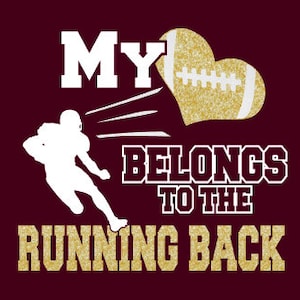 May include: A white graphic on a maroon background with a football player running with the text "My heart belongs to the running back" and a gold glitter heart with a football inside.