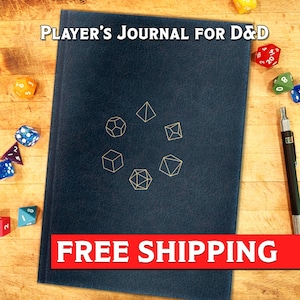 May include: A blue leather-bound journal with the text "PLAYER'S JOURNAL FOR D&D" on the front cover. The cover also features a gold design of various dice shapes.