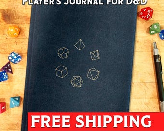 May include: A blue leather-bound journal with the text "PLAYER'S JOURNAL FOR D&D" on the front cover. The cover also features a gold design of various dice shapes.