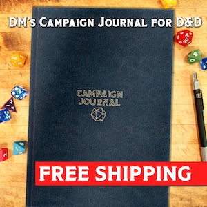 May include: A blue leather-bound journal with the text "DM's Campaign Journal for D&D" and "Campaign Journal" in gold lettering. The journal has a gold-colored 20-sided die symbol on the front cover. The text "FREE SHIPPING" is printed in red at the bottom of the image.