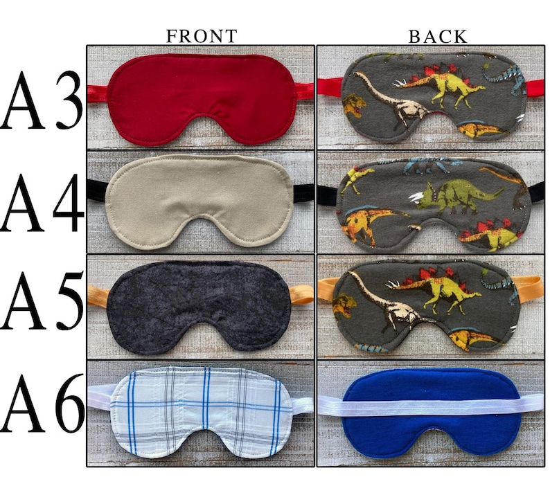 May include: A collection of four sleep masks labeled A3 through A6, showing front and back views. The masks feature various designs including solid red, solid beige, dark gray textured fabric, and a blue and white plaid pattern with elastic straps.