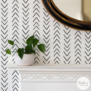 Arrow pattern removable wallpaper in a boho interior design room