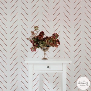 feminine home interior with neutral lines print wallpaper