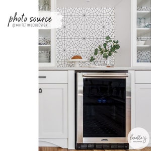 minimalistic kitchen interior with wallpapered nook