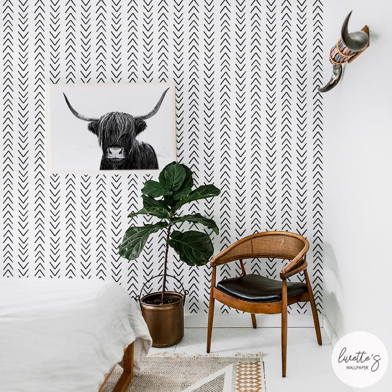 Arrow print removable wallpaper in a Scandinavian interior design bedroom