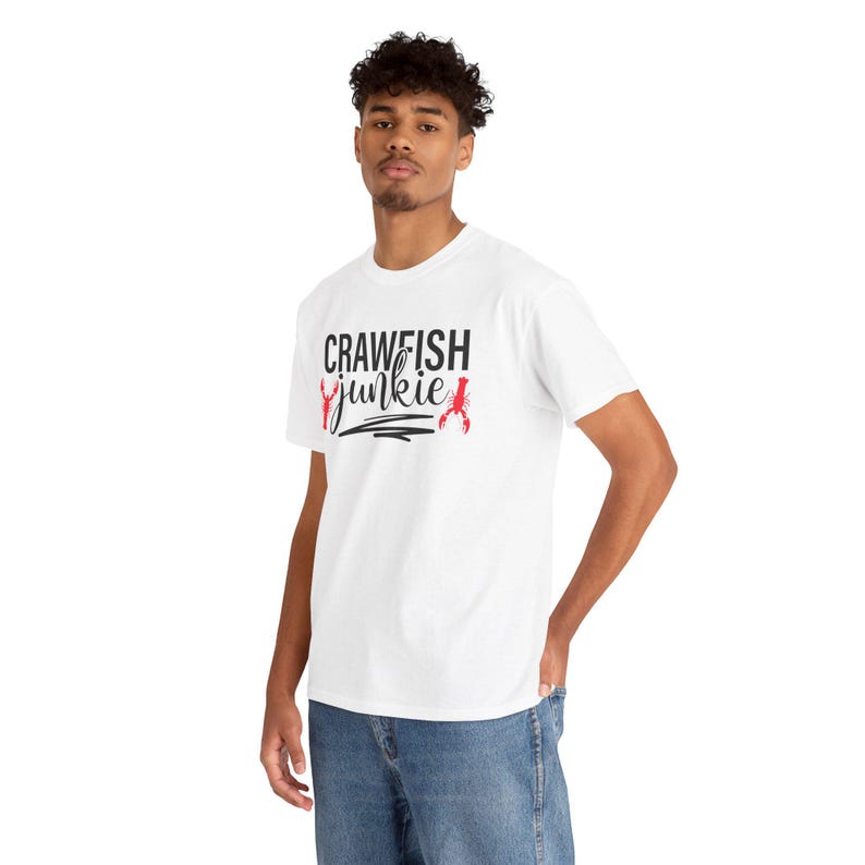 May include: White t-shirt with black text that reads "Crawfish Junkie" and two red crawfish illustrations.