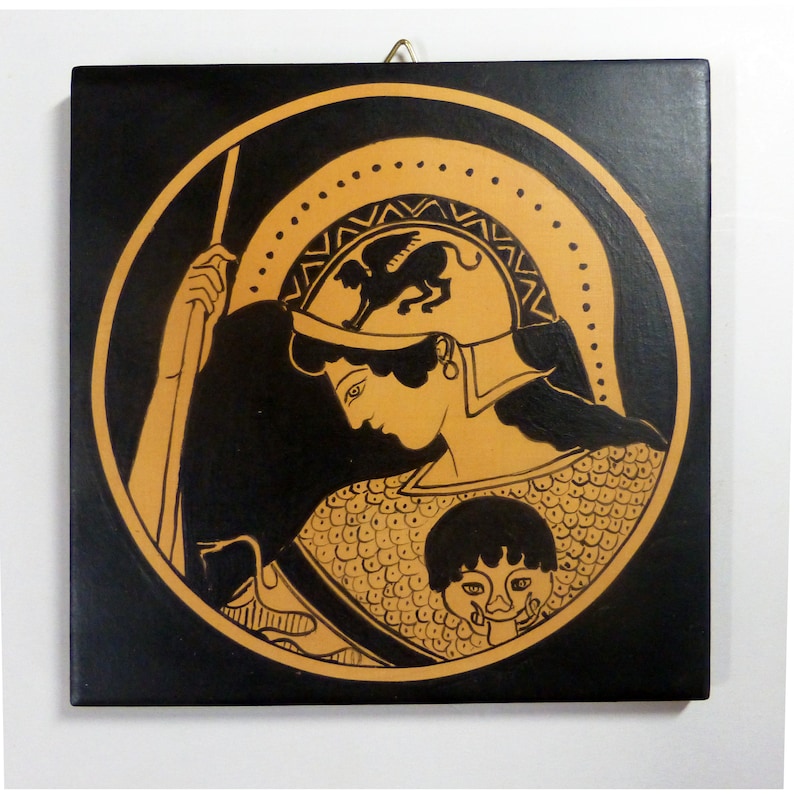 May include: Square wall art featuring a classical Greek warrior in a helmet with a winged creature, rendered in black and tan. The artwork is set against a black background, with a circular design and a decorative border.