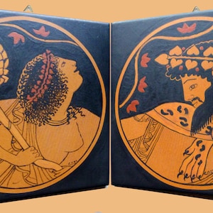 May include: Two square wall art pieces with ancient Greek-style illustrations. One depicts a figure holding a staff with a pinecone-like top, the other a bearded man with a laurel wreath. Both are in orange and black.