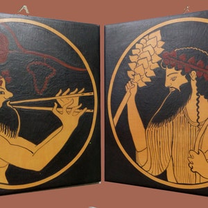 May include: Two square paintings featuring ancient Greek figures in black and gold. One figure plays a flute, the other holds wheat. The figures are within gold circles, evoking classical art.
