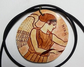 Ceramic Greek Nike Necklace - Symbol of Victory and Good Fortune. Ceramic disk made and painted by hand with image of Greek Nike