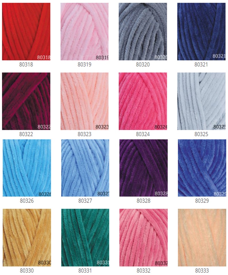 May include: A collection of colorful yarn skeins in various shades, including red, pink, blue, and green. Each skein has a soft, velvety texture. The image displays a range of colors suitable for knitting and crochet projects.