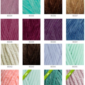 May include: A collection of colorful yarn skeins in various shades, including pink, teal, brown, and blue. Each skein has a soft, velvety texture. The image includes the product numbers 80334 through 80349.