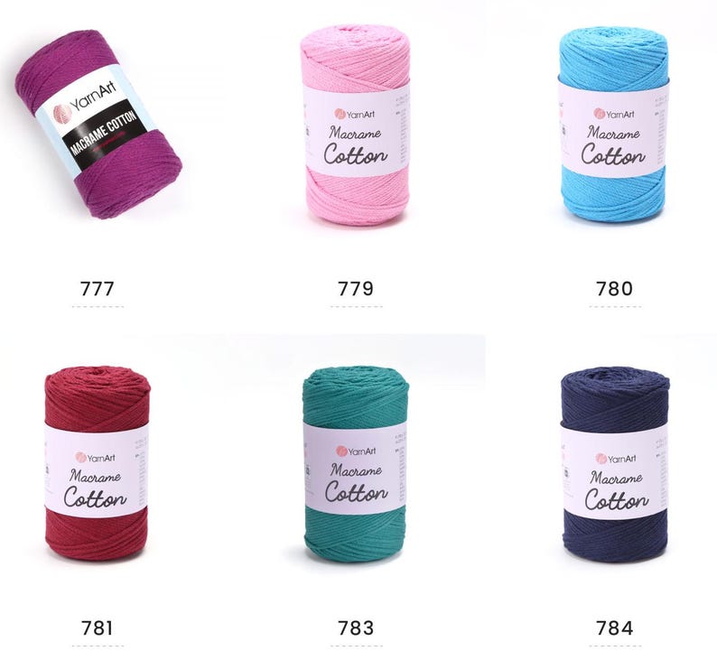May include: A collection of colorful YarnArt Macrame Cotton yarn skeins. The colors include shades of purple, pink, blue, red, teal, and navy. Each skein has a label with the brand name and product details. The numbers 777, 779, 780, 781, 783, and 784 are visible.