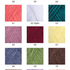 Peut inclure: Un nuancier de fils de laine, num&eacute;rot&eacute; de 58 &agrave; 73, pr&eacute;sentant une vari&eacute;t&eacute; de couleurs, notamment le jaune, le rose, le vert, l'orange, le blanc, le bleu sarcelle, le violet, le rouge, le beige, le marron et le bleu.