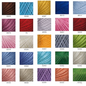 May include: A chart of 36 different colors of embroidery floss, each color is wound into a ball and displayed in a grid pattern. The colors range from white to black, with shades of red, blue, green, yellow, pink, and brown.