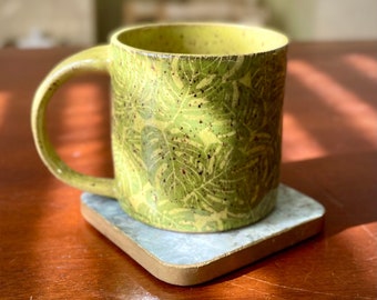 Monstera print handmade pottery coffee mug