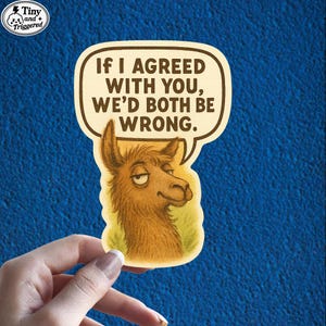May include: A sticker featuring a cartoon llama with a smug expression. The llama is brown and tan, set against a green background. A speech bubble above the llama reads, "If I agreed with you, we'd both be wrong."