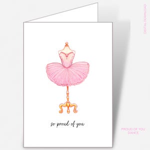 May include: A greeting card featuring a watercolor illustration of a pink ballet tutu on a golden stand. The text "so proud of you" is written below the tutu. The words "digital download" and "proud of you dance" are also visible.