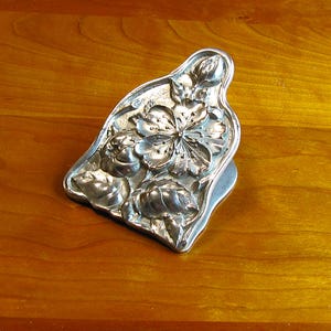 May include: A rustic wooden sign with the text "Welcome to our home" in white lettering. The sign features a distressed finish and a simple, inviting design, perfect for a front porch or entryway.