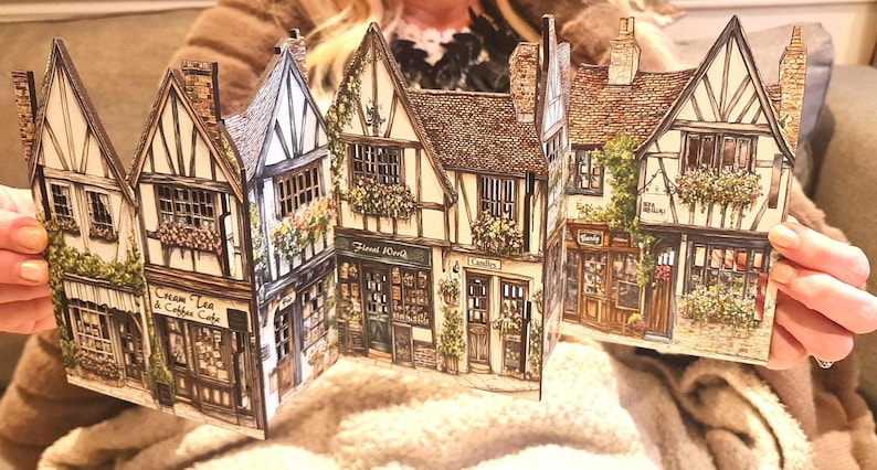 Mini tudor village scene with cut out windows for led lights, small house ornament