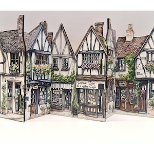 Mini tudor village scene with cut out windows for led lights, small house ornament