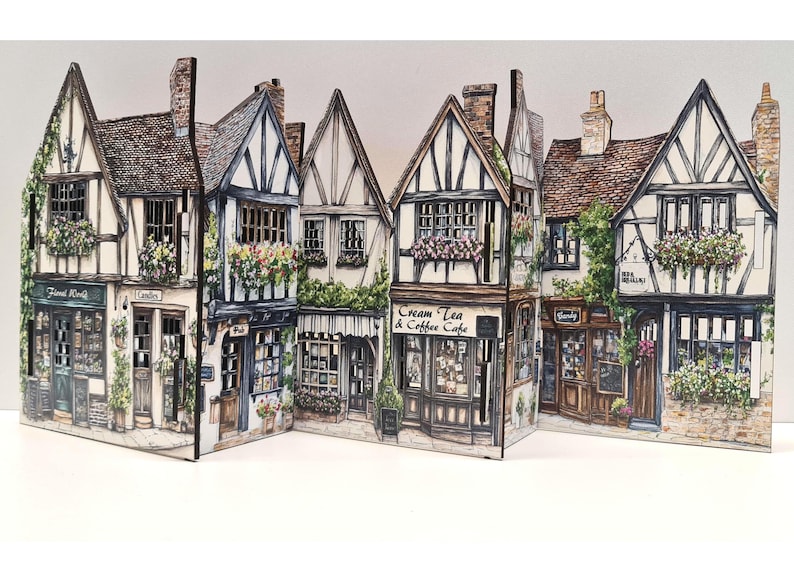 Mini tudor village scene with cut out windows for led lights, small house ornament